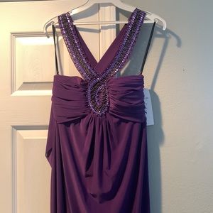 NWT purple long length beaded cross front and back. Size Small. Bust- 34”